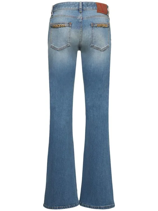 Valentino   Chain logo flared denim jeans 