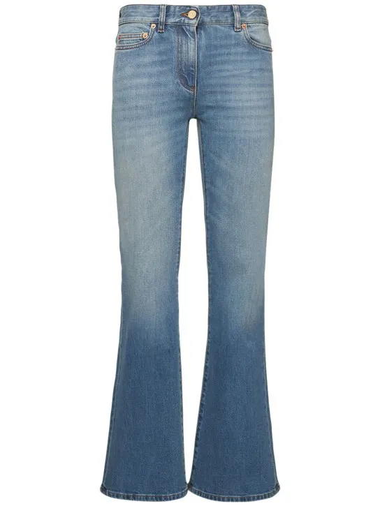 Valentino   Chain logo flared denim jeans 